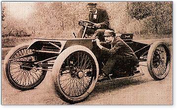 The "Sweepstakes " racer of 1901, with Henry Ford at the wheel and Ed Huff on running board.